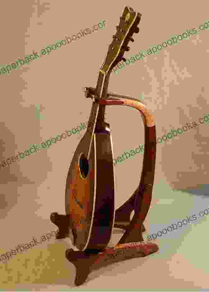 A Close Up Of A Mandolin On A Music Stand Alfred S Basic Mandolin Method 2: The Most Popular Method For Learning How To Play (Mandolin) (Alfred S Basic Mandolin Library)