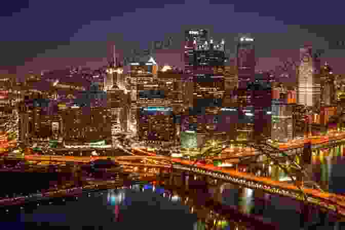 A Panoramic View Of Pittsburgh At Night, Its Skyline Twinkling With Lights The Pittsburgh That Stays Within You