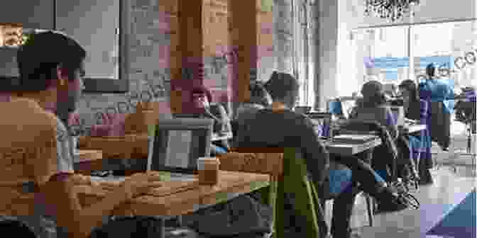 A Person Using A Laptop In A Crowded Cafe Civil Twilight: Poems Jeffrey Schultz