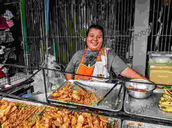 A Vibrant Street Food Vendor Serving Up Delicious Thai Cuisine. Bangkok FreeStyle Susan Croce Kelly