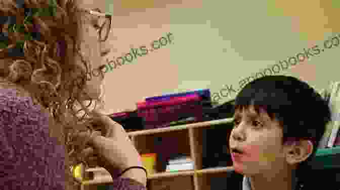 Jennifer Jensen Using A Microphone To Communicate During A Speech Therapy Session Verbal Behavior Targets Jennifer Jensen