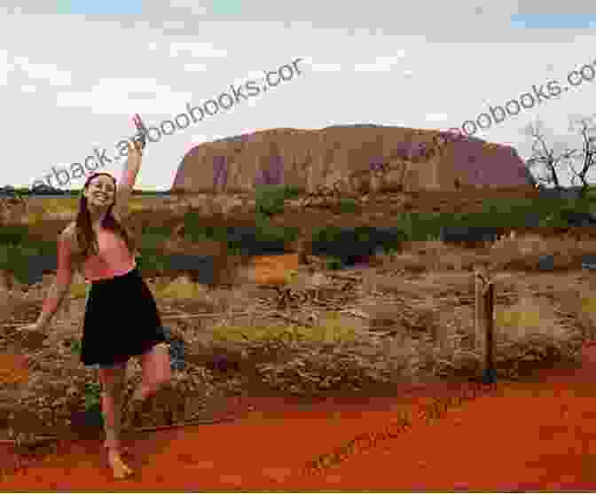 Just Deserts Book Cover Featuring A Woman Standing In The Outback With A Sunset In The Background Just Deserts (Hetta Coffey 4)